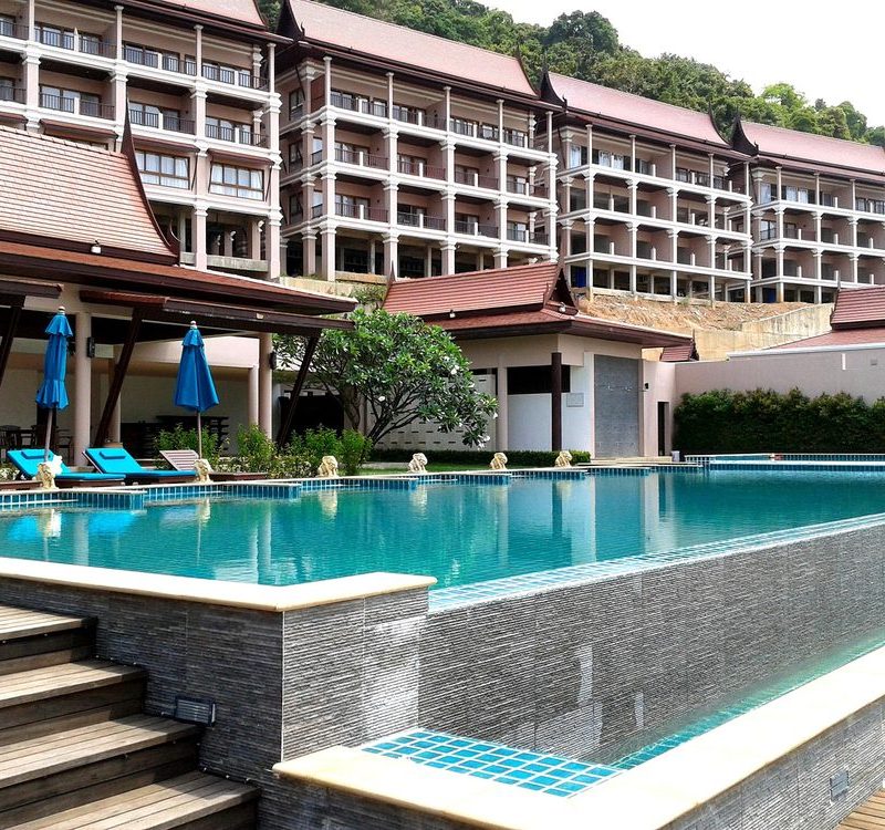 Luxury hotel facade with swimming pool